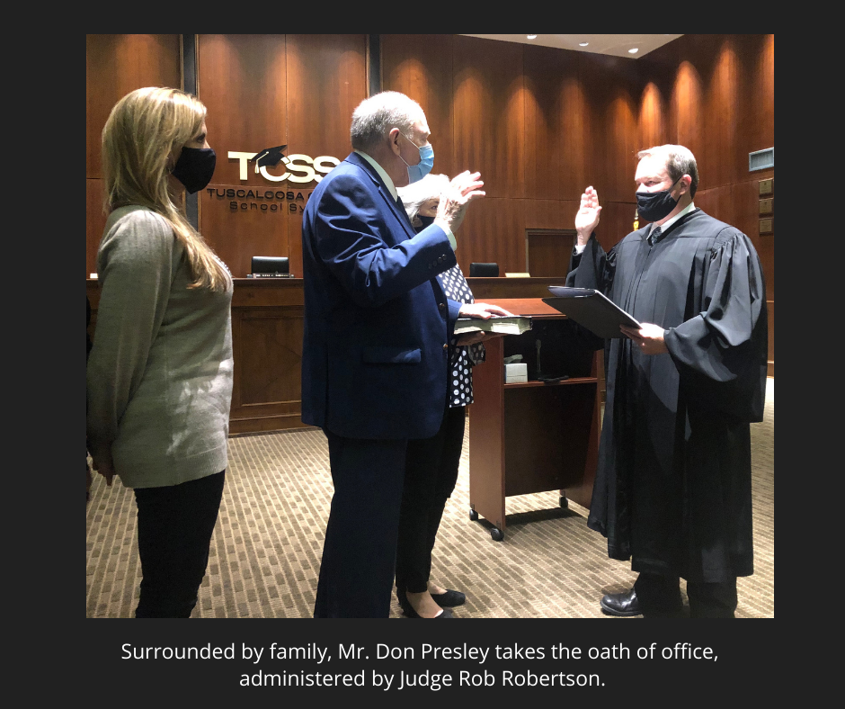 photo of Mr. Presley taking oath of office, surrounded by family. Oath administered by Judge Rob Robertson. photo of Mr. Presley taking oath of office, surrounded by family. Oath administered by Judge Rob Robertson.
